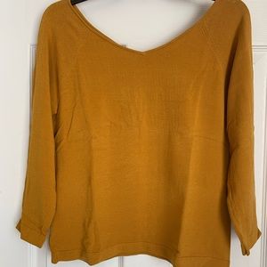 V-neck mustard colored blouse